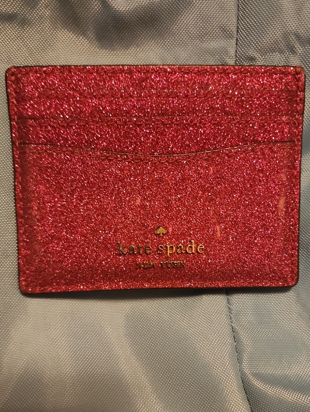 kate spade Hot Pink Glitter Card Holder with Gold Logo